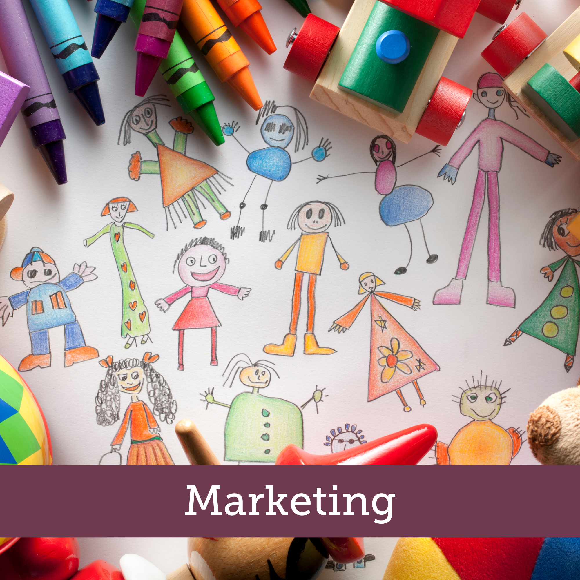 children's toys on a table with crayons and markers with a banner that reads marketing