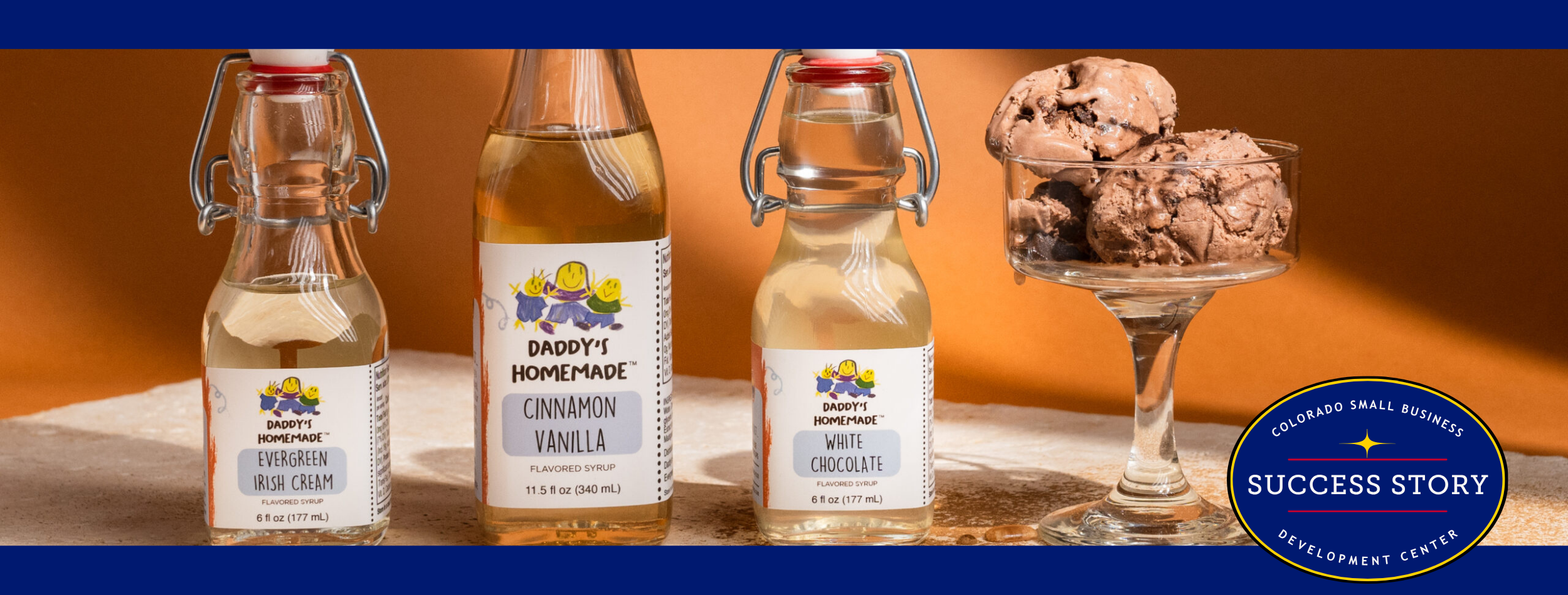 three bottles of different flavored syrups next to a bowl of chocolate ice cream.