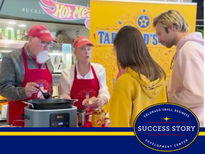 On the left it shows the owners of Tad's Dad's Chili with two customers on the right that are being served chili.
