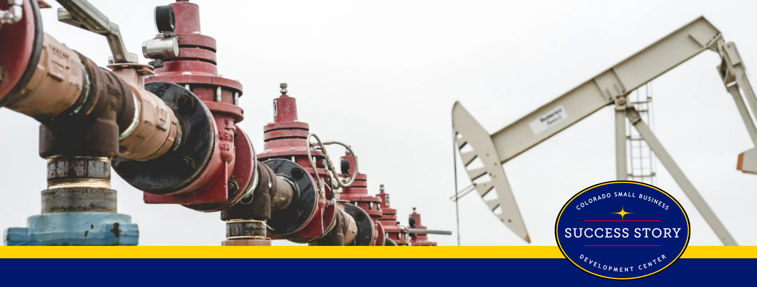 several oil pumps are lined up next to each other.