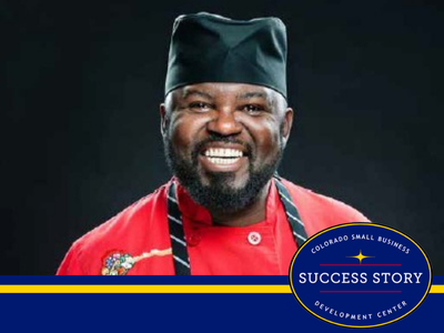 a person wearing a chef's hat and a red apron.